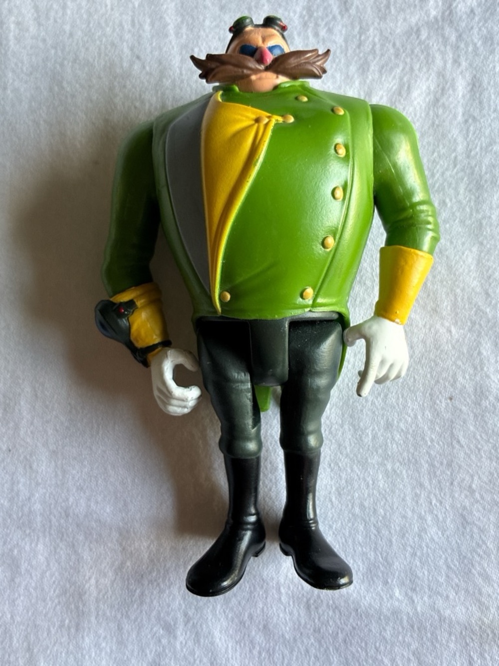 Dr. Eggman Cartoon Villain Figure in Green Coat with Yellow Accents